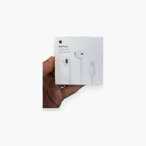 Écouteurs filaires Lightning ZM826 pour iPhone avec connecteur mâle et câble blanc